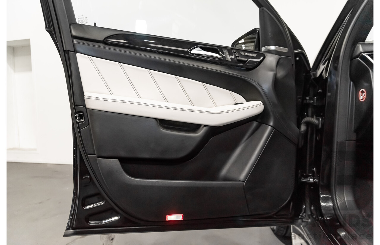 5/2014 Mercedes-Benz ML 63 AMG (4x4) 166 4d Wagon Black 5.5L Twin Turbo V8