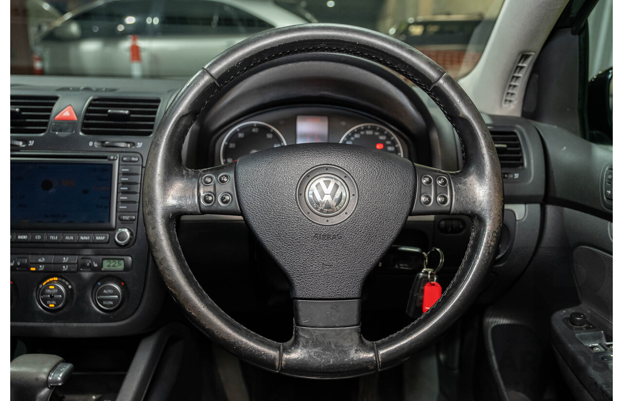 3/2006 Volkswagen Golf 2.0 FSI Sportline 1K 5d Hatchback Black 2.0L