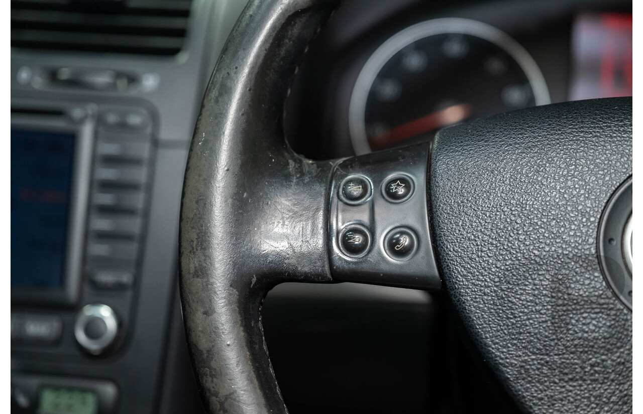 3/2006 Volkswagen Golf 2.0 FSI Sportline 1K 5d Hatchback Black 2.0L