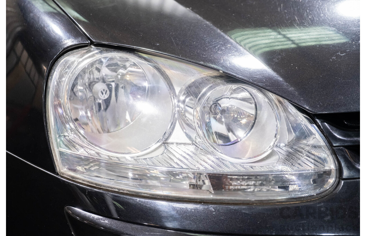 3/2006 Volkswagen Golf 2.0 FSI Sportline 1K 5d Hatchback Black 2.0L