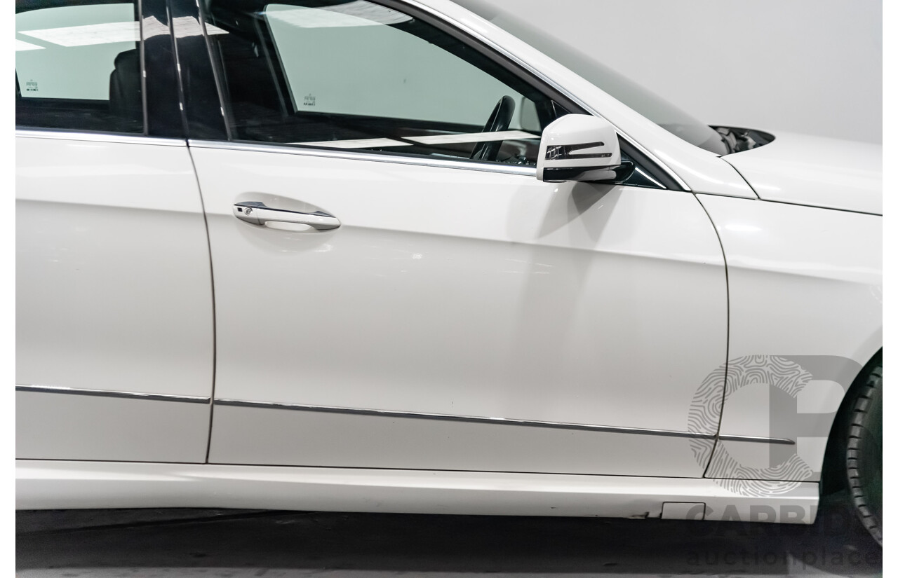 4/2013 Mercedes-Benz E200 Elegance BE 212 4d Sedan White 1.8L Turbo