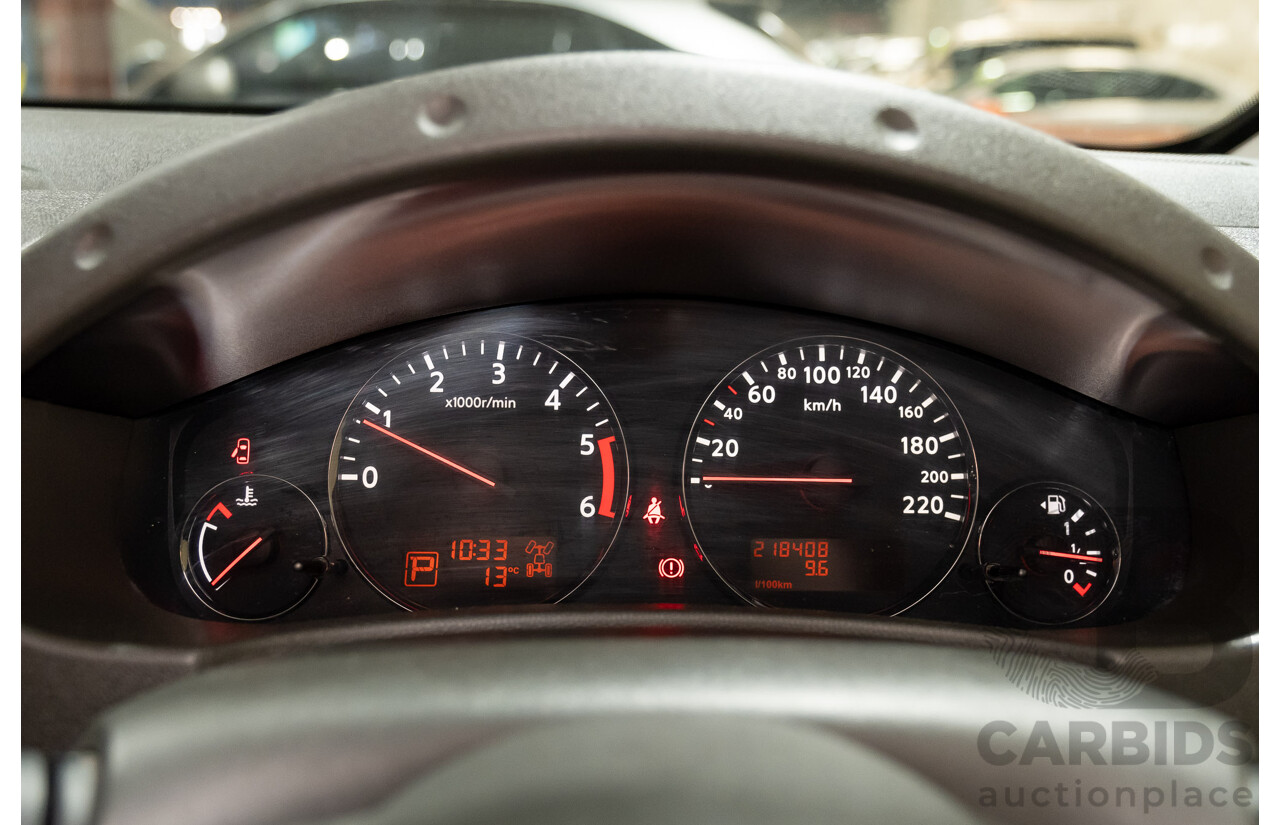 3/2012 Nissan Navara ST-X (4x4) D40 MY12 Dual Cab P/Up White Turbo Diesel V6 3.0L