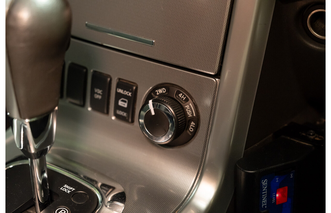 3/2012 Nissan Navara ST-X (4x4) D40 MY12 Dual Cab P/Up White Turbo Diesel V6 3.0L