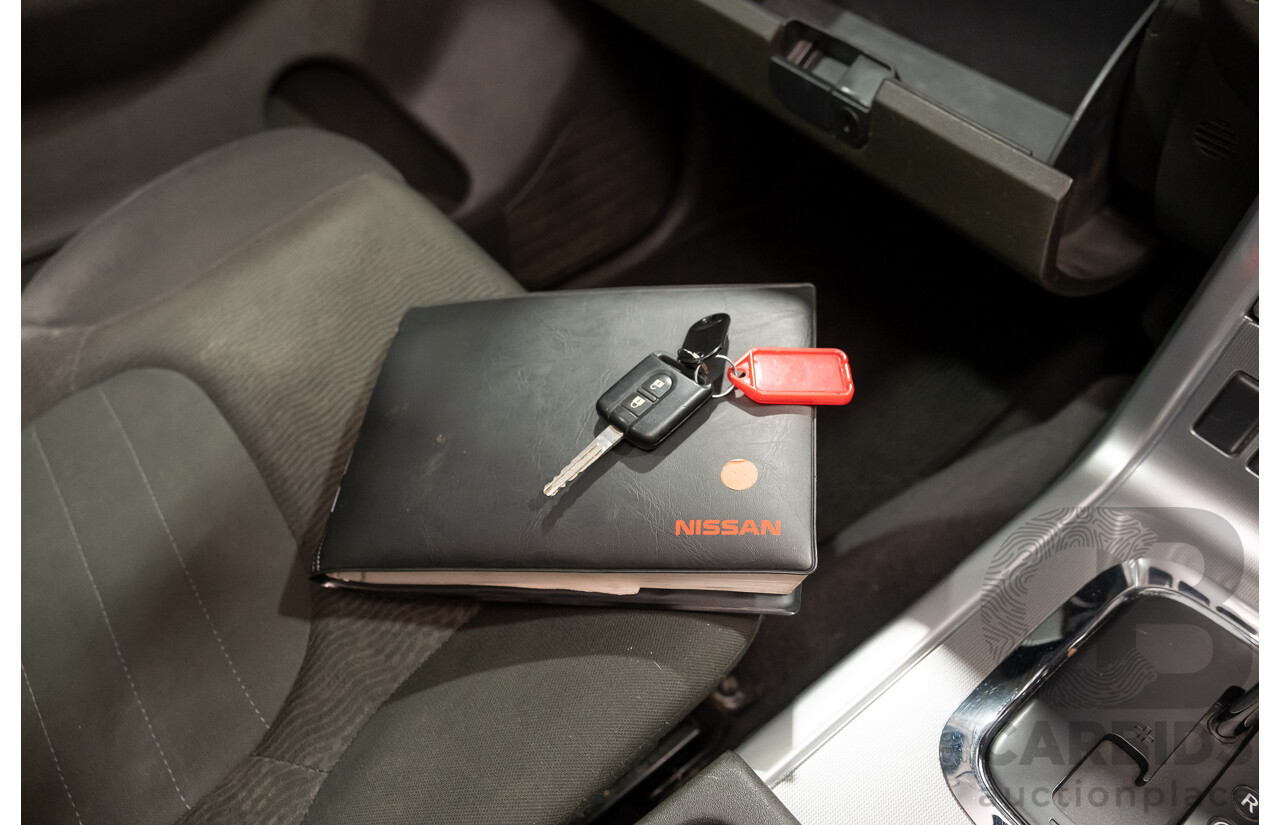 3/2012 Nissan Navara ST-X (4x4) D40 MY12 Dual Cab P/Up White Turbo Diesel V6 3.0L