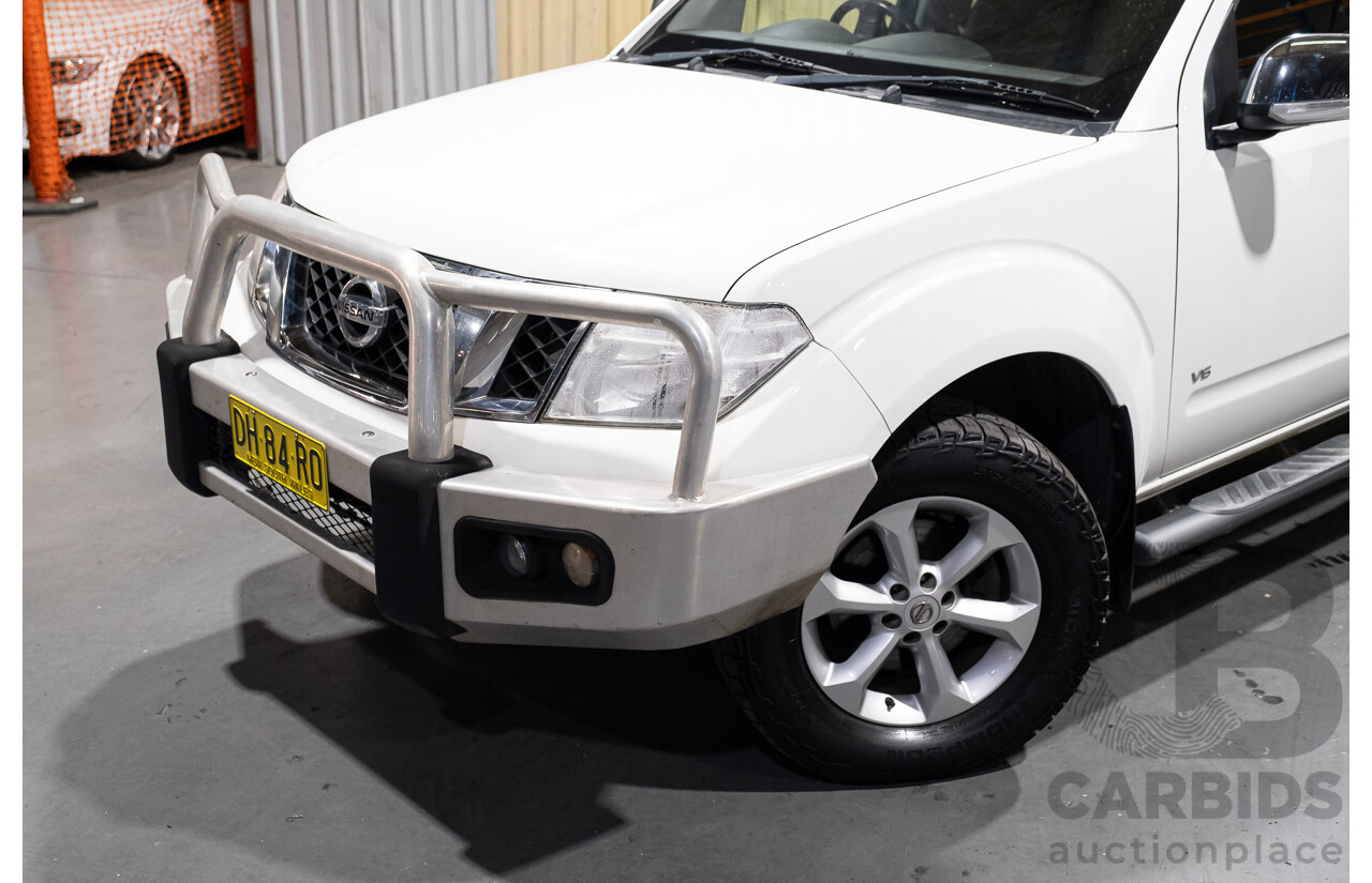 3/2012 Nissan Navara ST-X (4x4) D40 MY12 Dual Cab P/Up White Turbo Diesel V6 3.0L