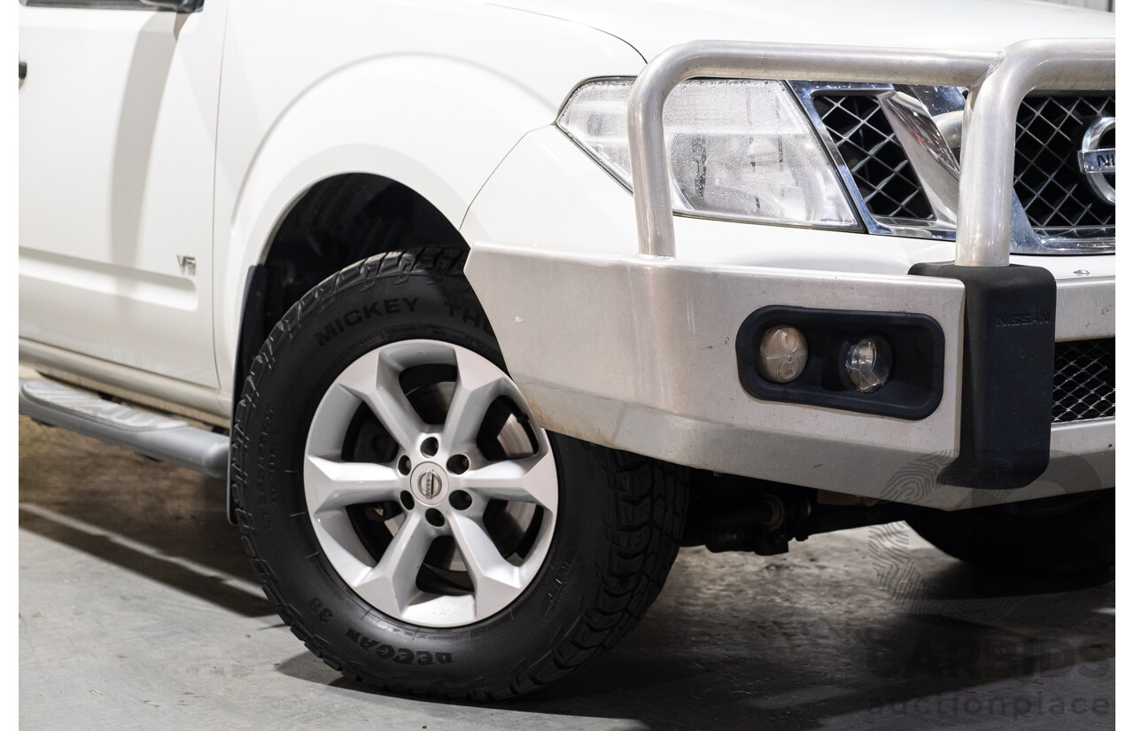 3/2012 Nissan Navara ST-X (4x4) D40 MY12 Dual Cab P/Up White Turbo Diesel V6 3.0L