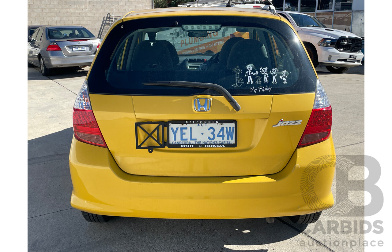 6/2006 Honda Jazz GLi MY06 5d Hatchback Yellow 1.3L