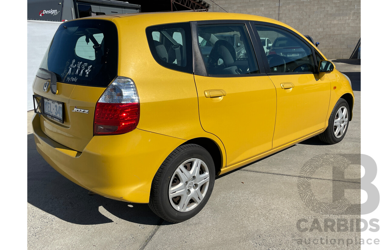 6/2006 Honda Jazz GLi MY06 5d Hatchback Yellow 1.3L