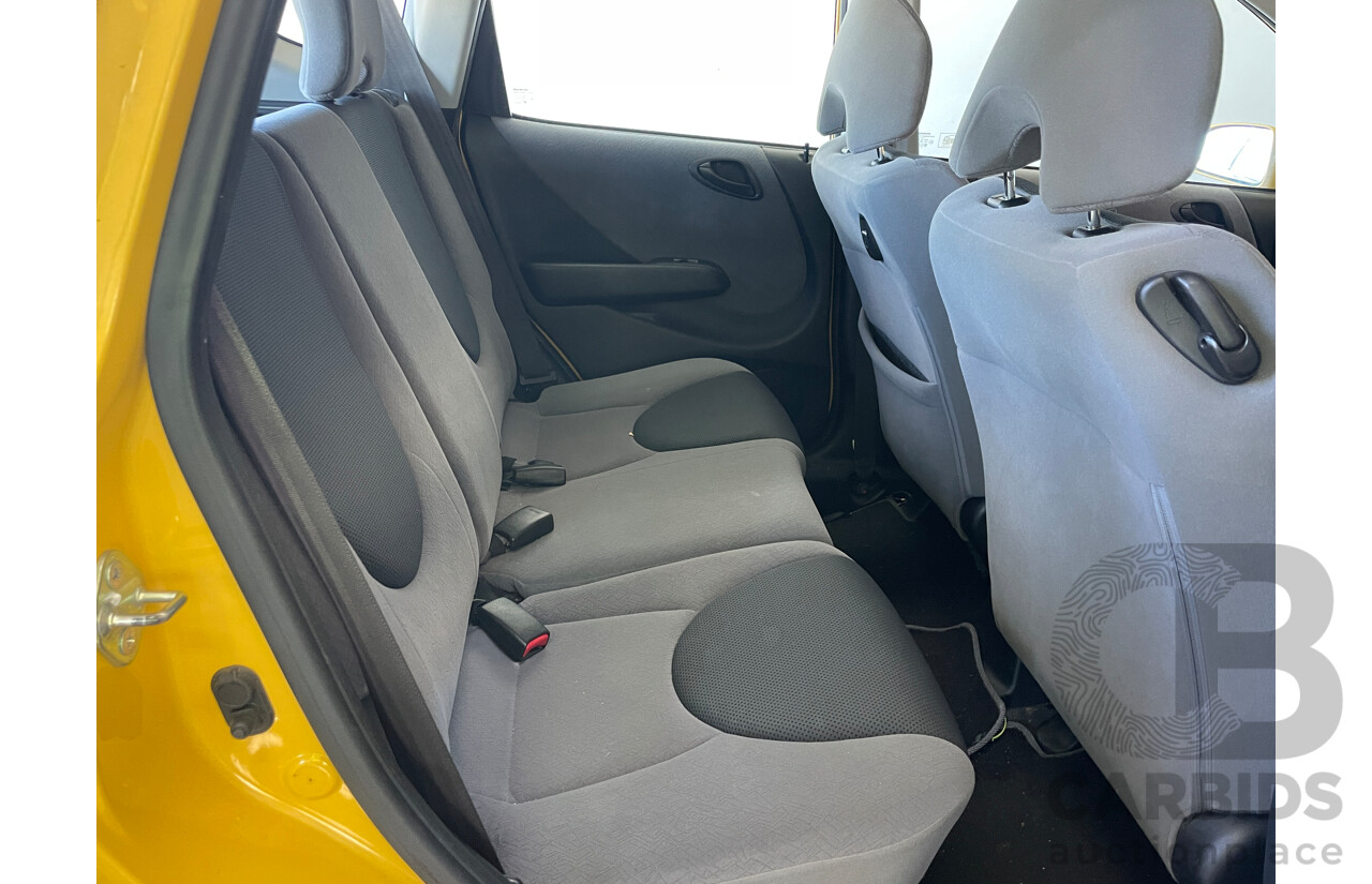 6/2006 Honda Jazz GLi MY06 5d Hatchback Yellow 1.3L