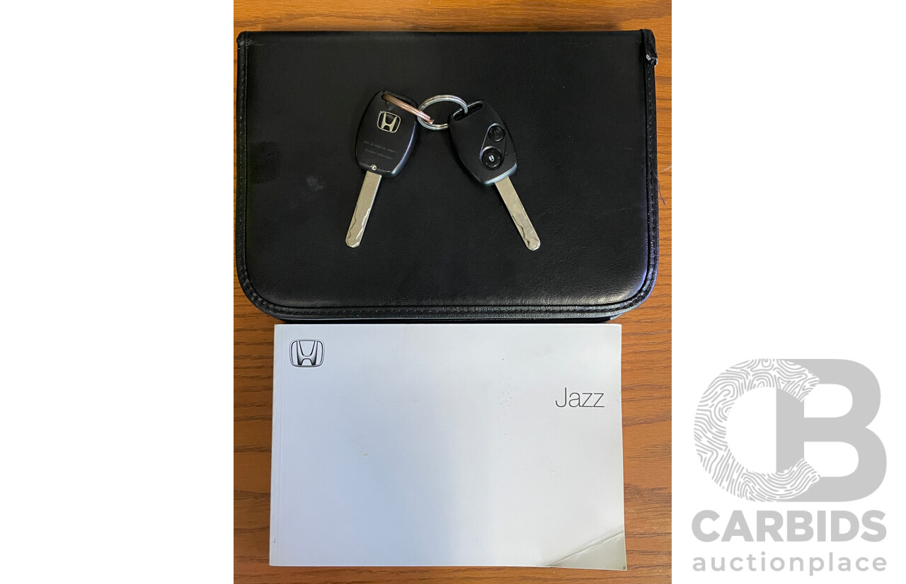 6/2006 Honda Jazz GLi MY06 5d Hatchback Yellow 1.3L