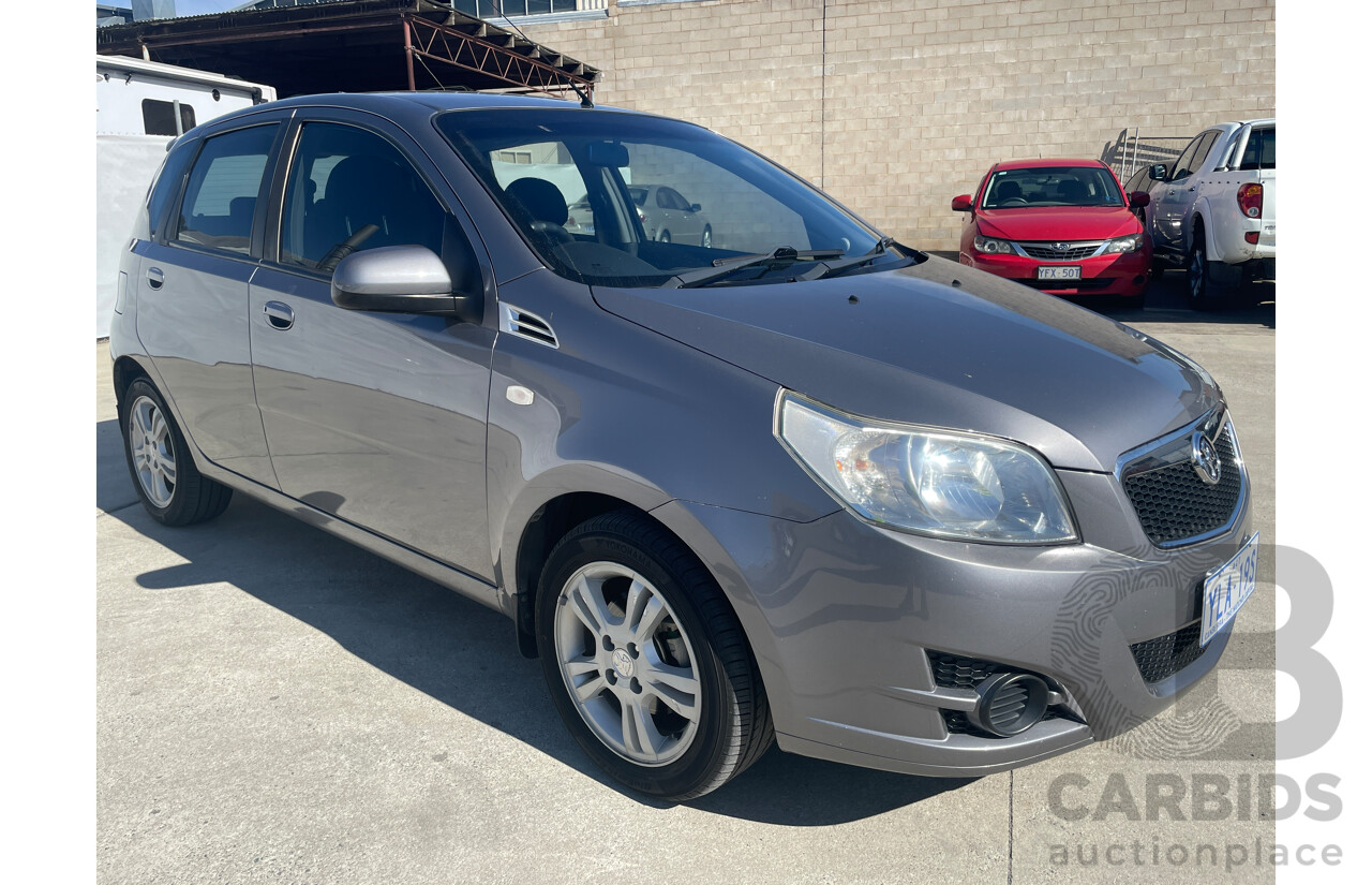 7/2010 Holden Barina  TK MY10 5d Hatchback Grey 1.6L