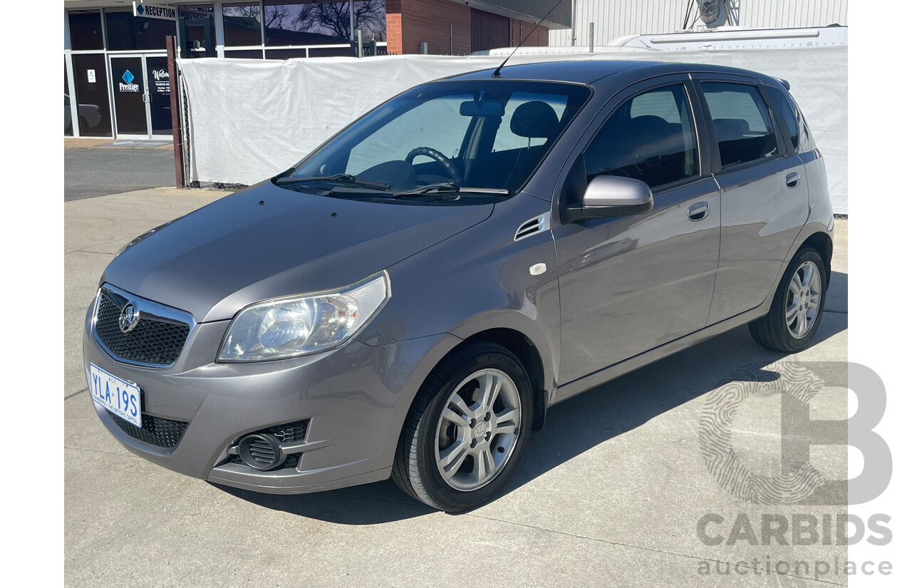 7/2010 Holden Barina  TK MY10 5d Hatchback Grey 1.6L