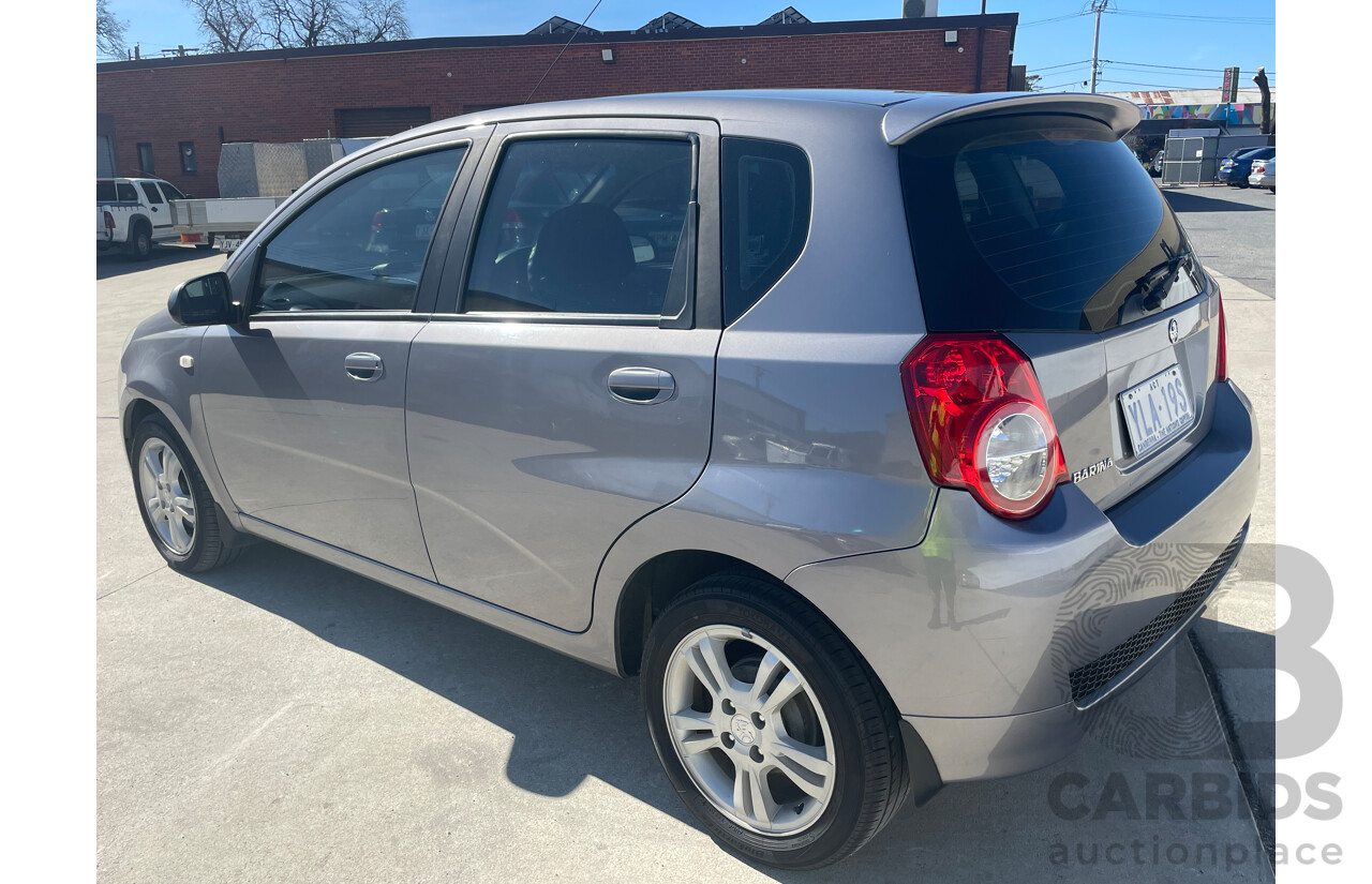 7/2010 Holden Barina  TK MY10 5d Hatchback Grey 1.6L
