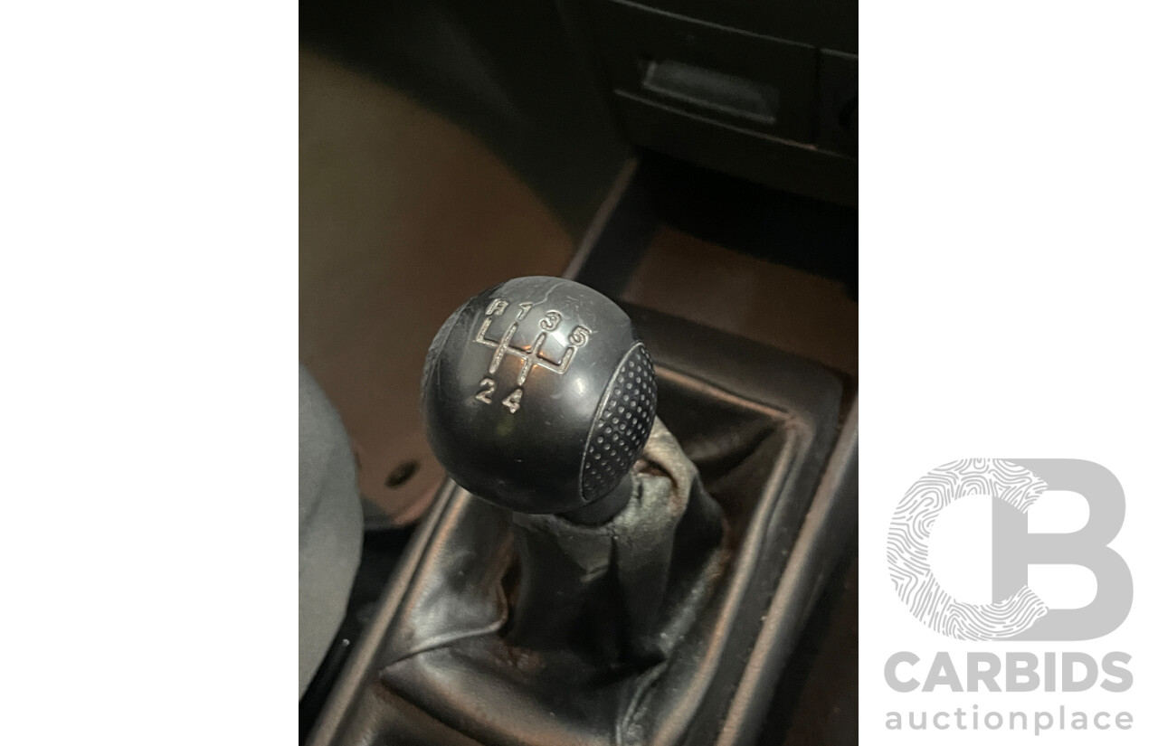 7/2010 Holden Barina  TK MY10 5d Hatchback Grey 1.6L