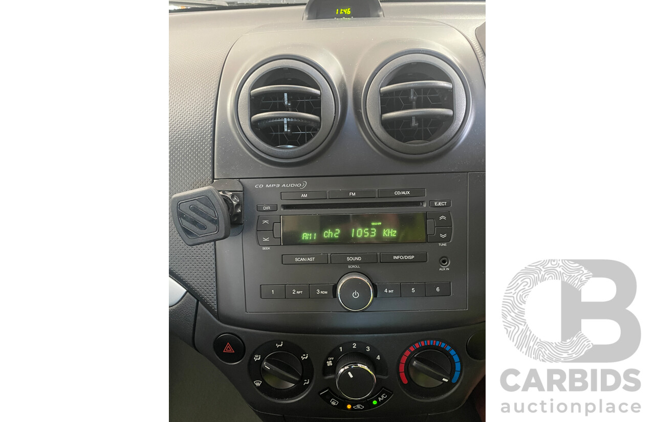 7/2010 Holden Barina  TK MY10 5d Hatchback Grey 1.6L