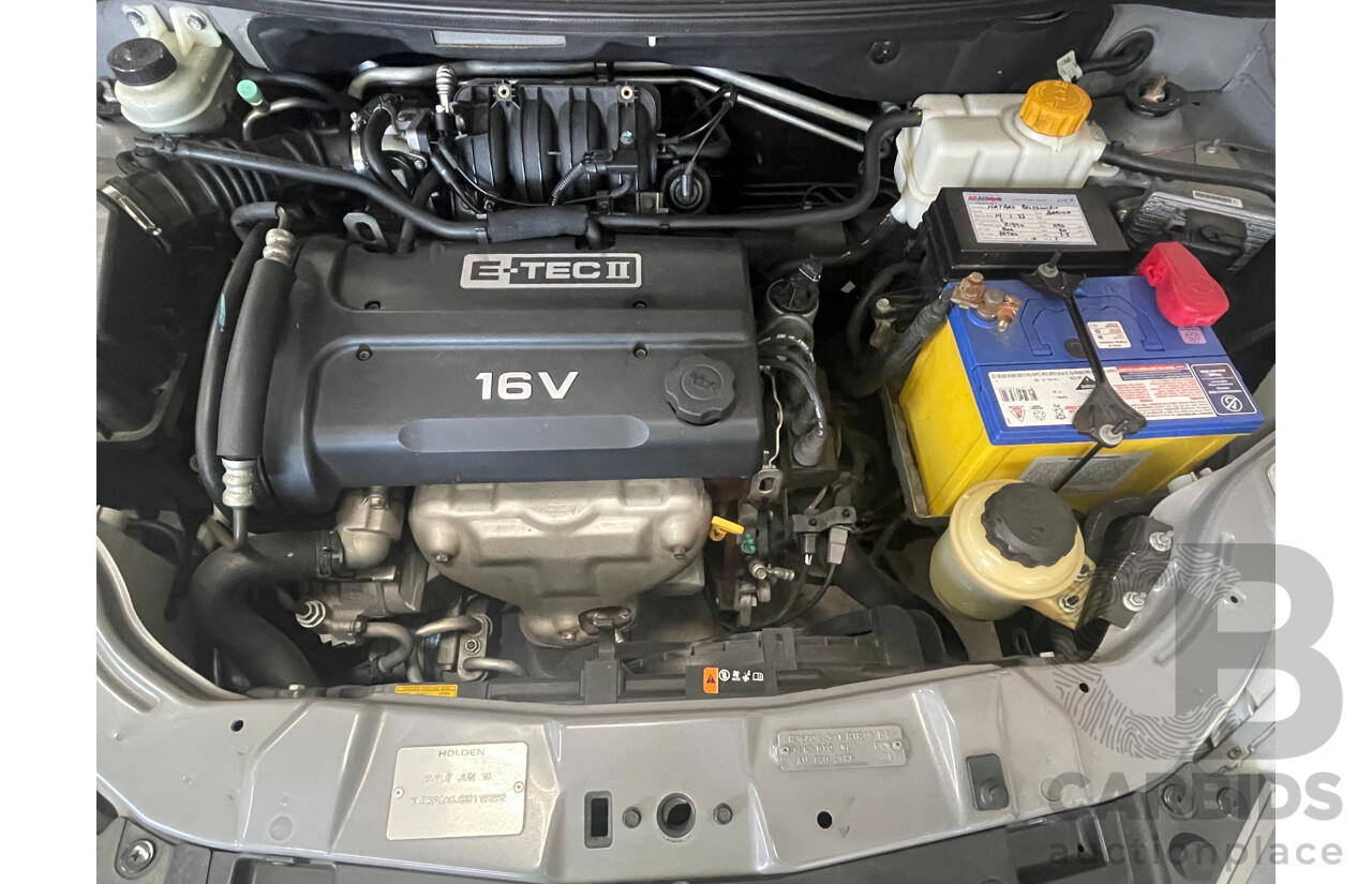 7/2010 Holden Barina  TK MY10 5d Hatchback Grey 1.6L