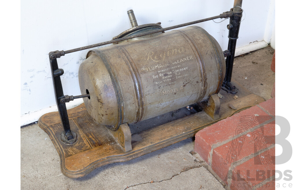 Fantastic Antique Regina Pneumatic Cleaner Hand Pump Model A on Oak Stand