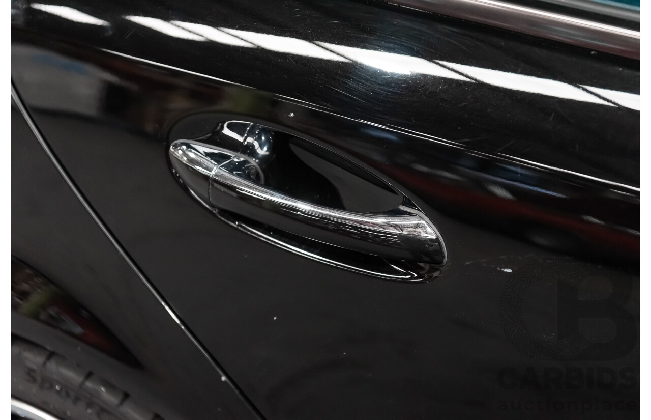 1/2006 Mercedes Benz E500 Avantgarde W211 MY06 UPGRADE 4d Sedan Black V8 5.0L