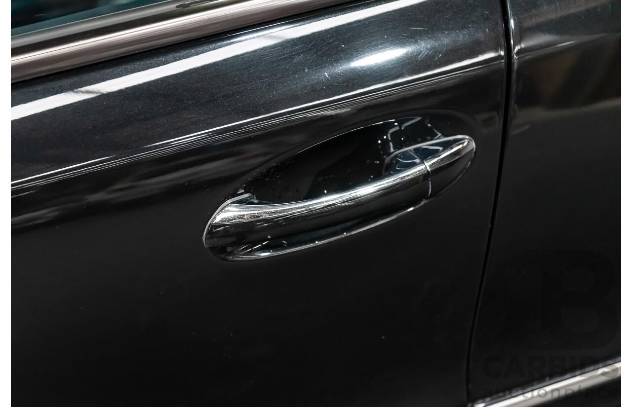 1/2006 Mercedes Benz E500 Avantgarde W211 MY06 UPGRADE 4d Sedan Black V8 5.0L