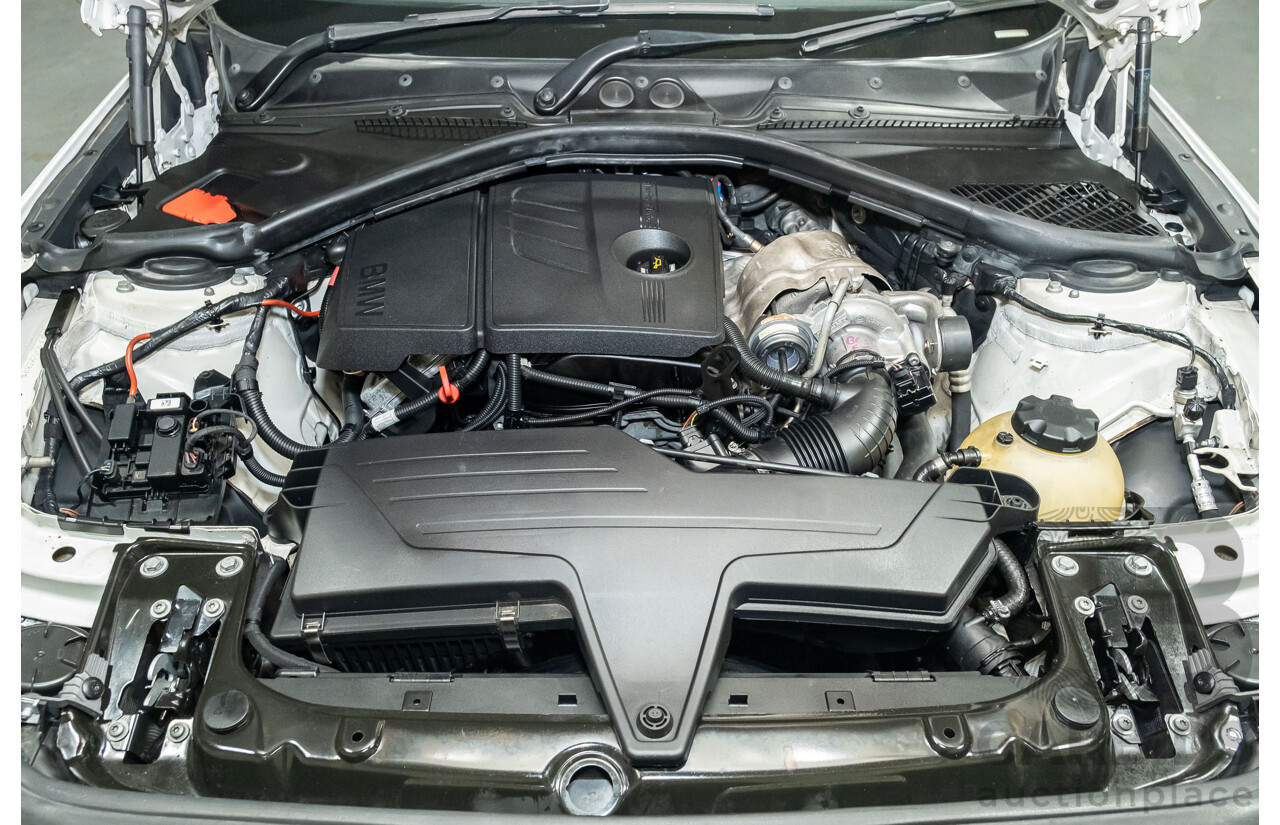 1/2012 BMW 116i F20 5d Hatchback White Turbo 1.6L