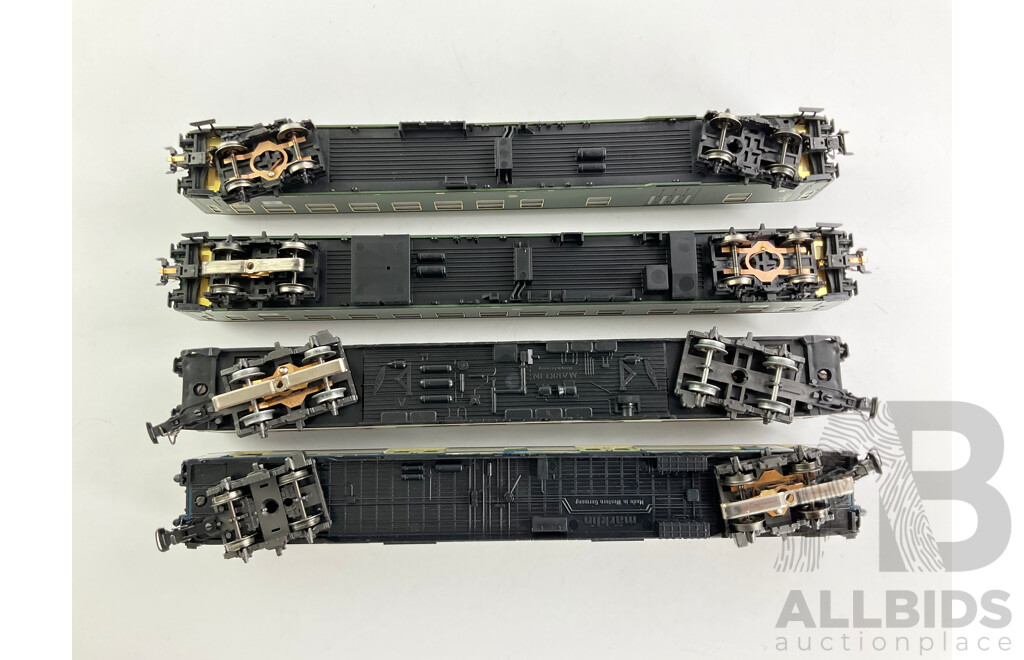 Collection of Four HO Scale German Passenger Cars Including Marklin