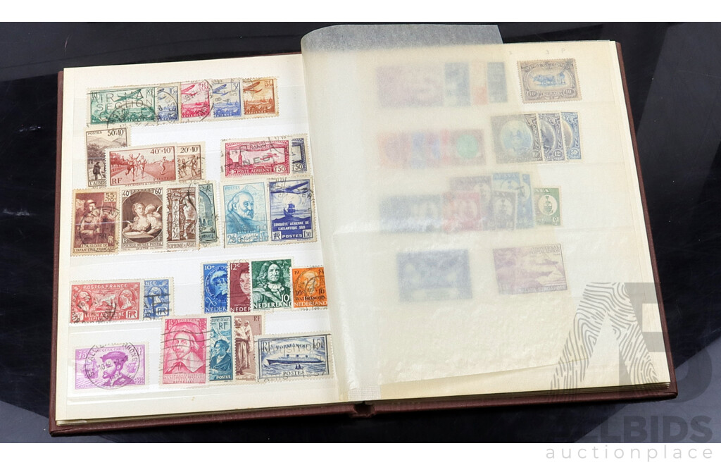 Collection of International Cancelled Stamp Albums From Singapore, United Kingdom, Netherlands and Many More