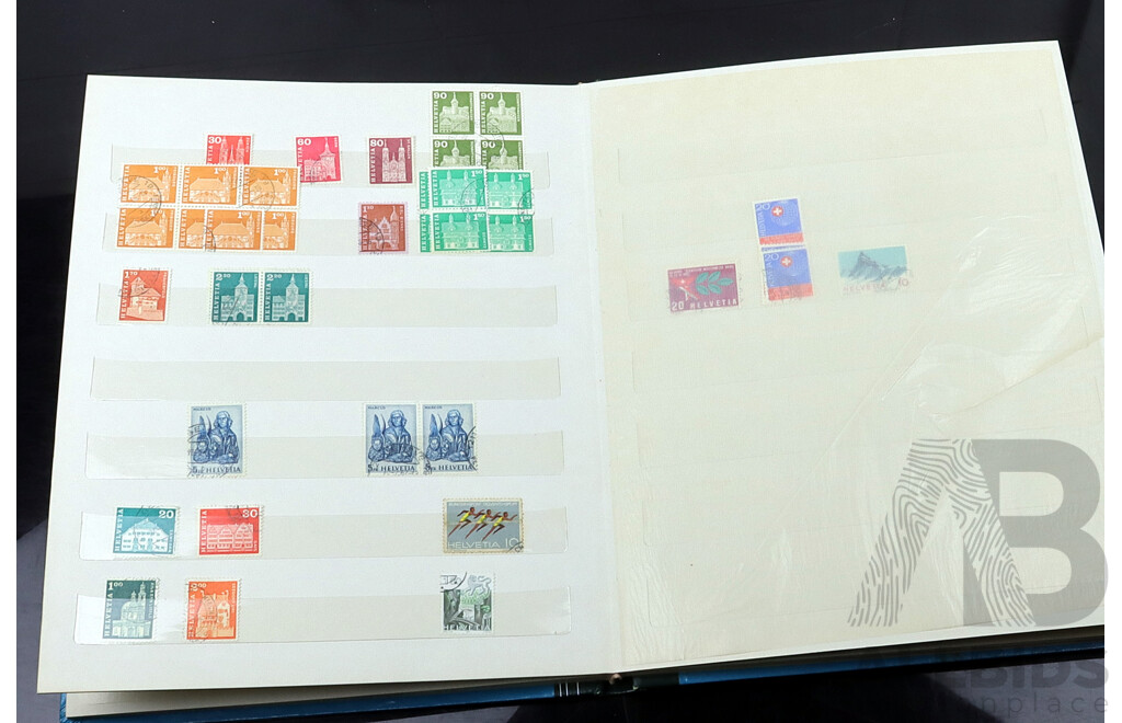 Collection of International Cancelled Stamp Albums From Singapore, United Kingdom, Netherlands and Many More