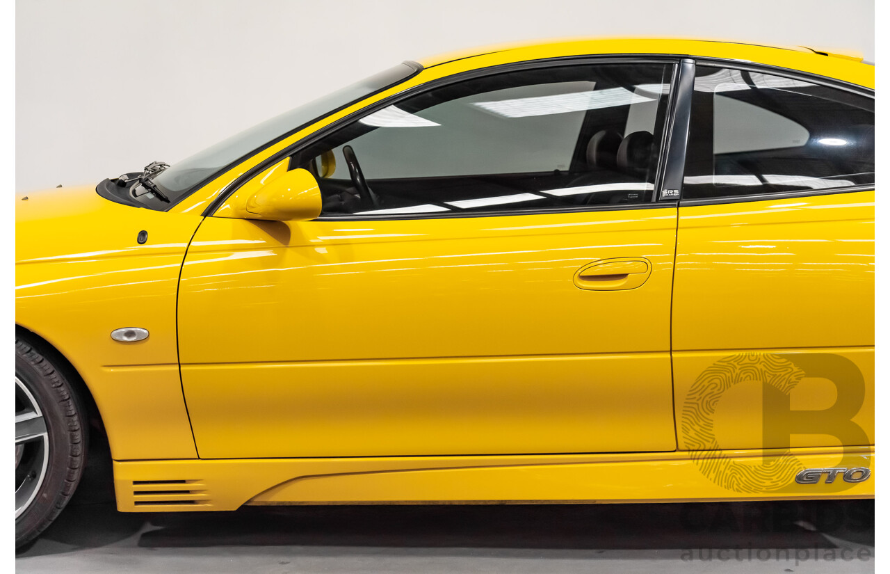 6/2003 Holden HSV Coupe GTO V2 2d Coupe Yellow Devil V8 5.7L