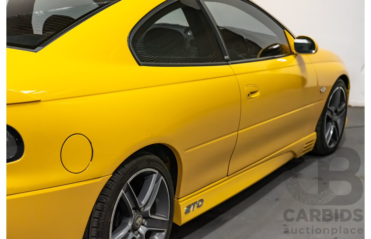 6/2003 Holden HSV Coupe GTO V2 2d Coupe Yellow Devil V8 5.7L