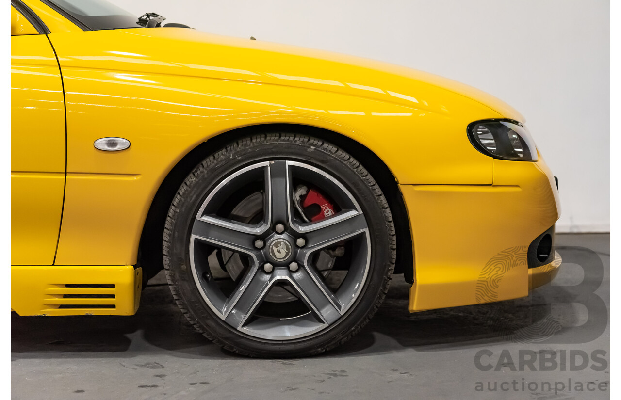 6/2003 Holden HSV Coupe GTO V2 2d Coupe Yellow Devil V8 5.7L