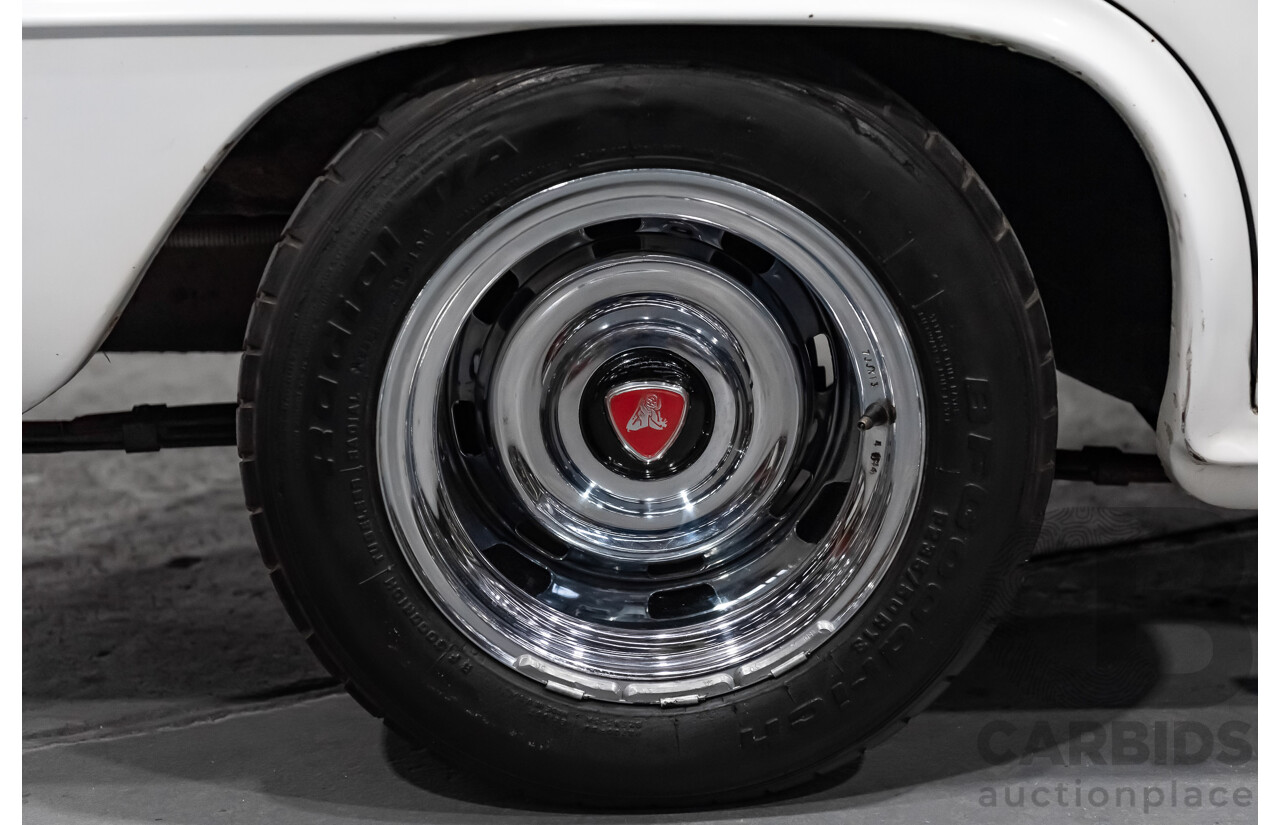 1/1958 Holden FC Special 4d Sedan India Ivory / Red 202ci