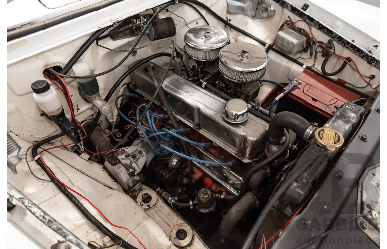 1/1958 Holden FC Special 4d Sedan India Ivory / Red 202ci