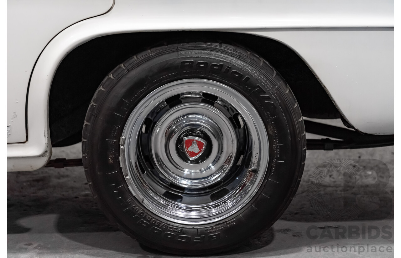 1/1958 Holden FC Special 4d Sedan India Ivory / Red 202ci