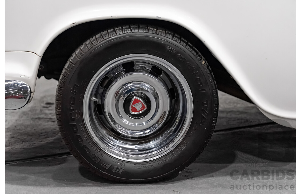 1/1958 Holden FC Special 4d Sedan India Ivory / Red 202ci