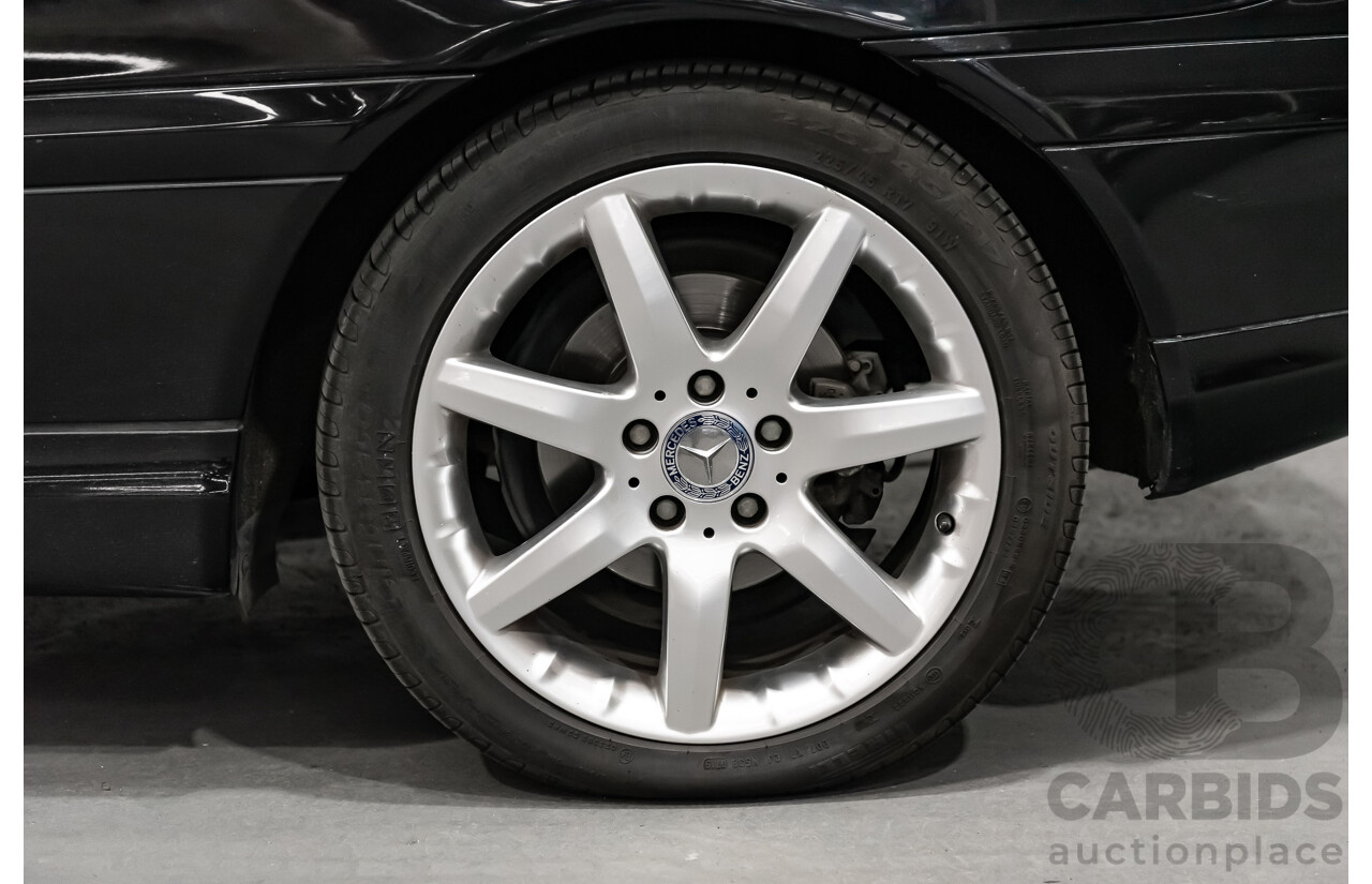 12/2002 Mercedes-Benz C200 Kompressor CL203 2d Coupe Obsidian Black Supercharged 1.8L