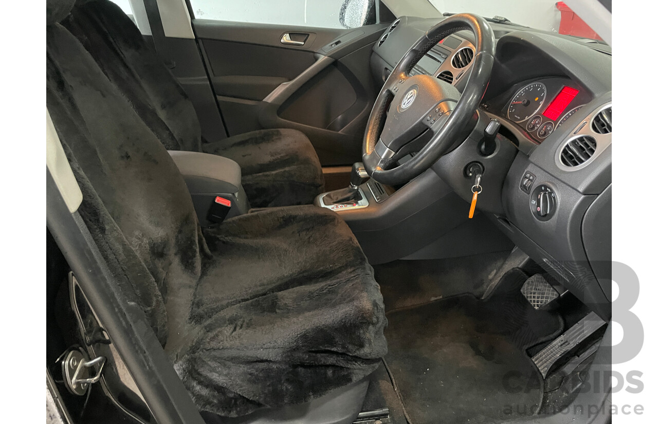 6/2009 Volkswagen Tiguan 125 TSI 5NC MY09 4d Wagon Black 2.0L