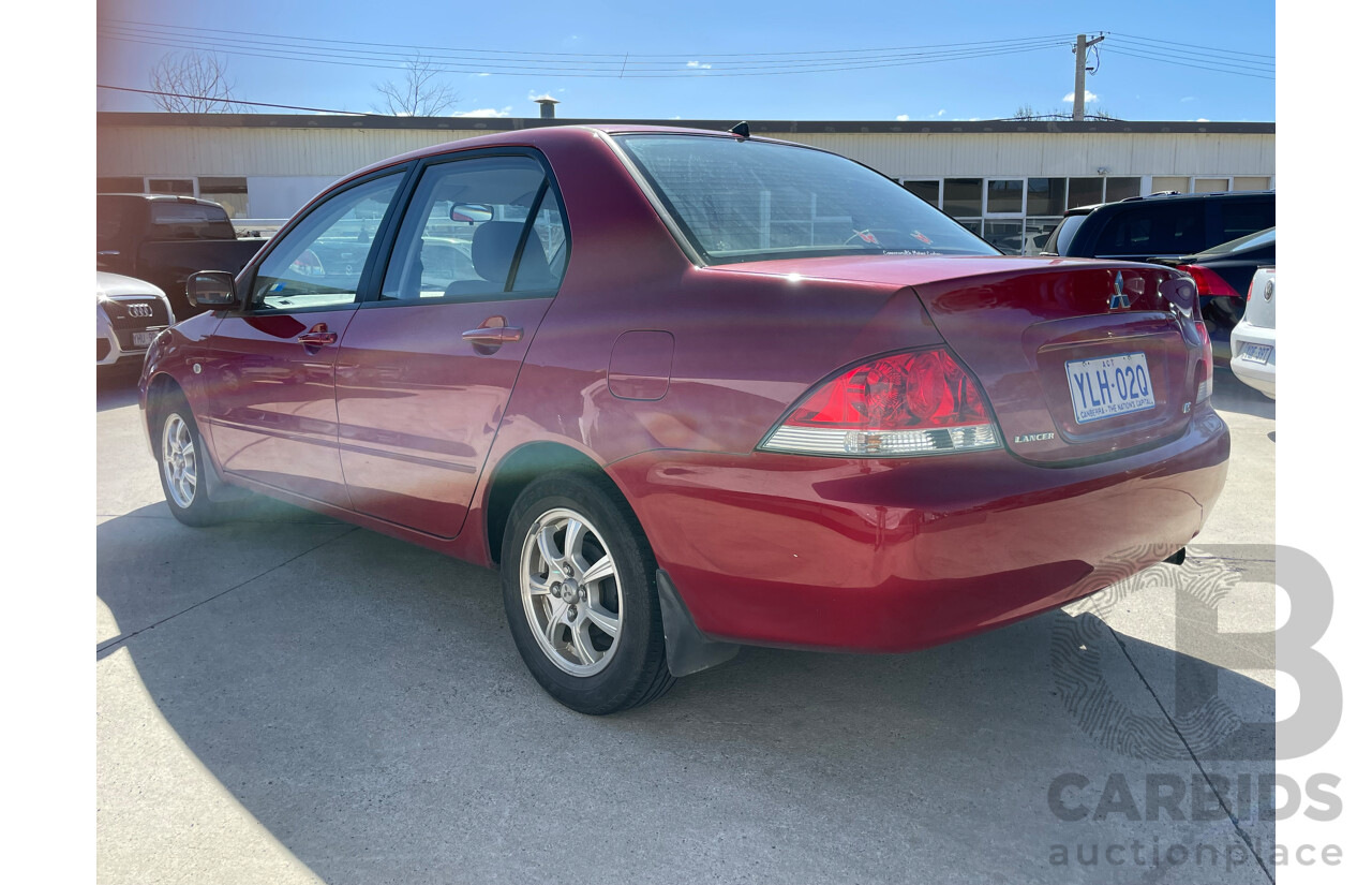 10/2004 Mitsubishi Lancer ES CH 4d Sedan Red 2.0L