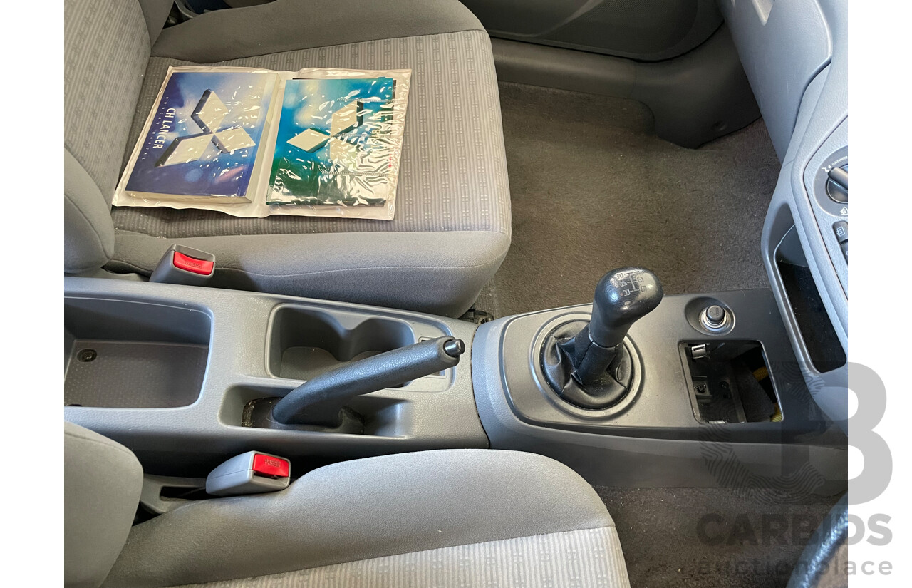 10/2004 Mitsubishi Lancer ES CH 4d Sedan Red 2.0L