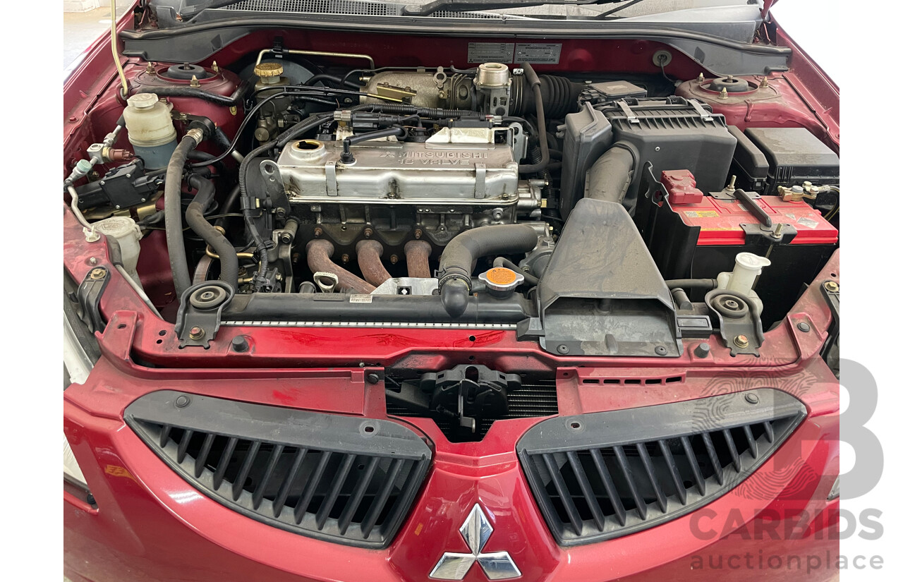 10/2004 Mitsubishi Lancer ES CH 4d Sedan Red 2.0L