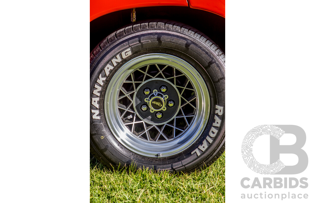 4/1974 Holden LH Torana SL/R 5000 Tribute 4d Sedan Orange V8 5.0L