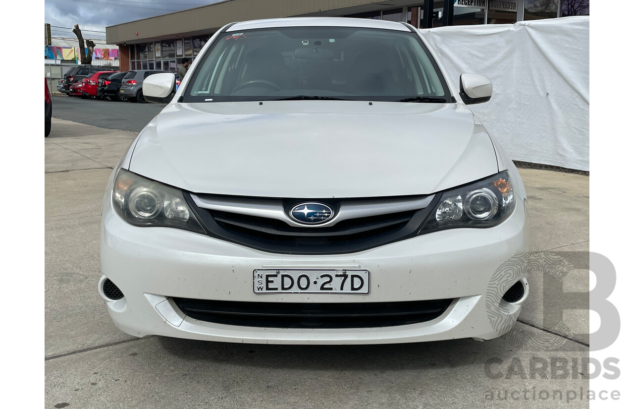 5/2010 Subaru Impreza R (awd) MY10 5d Hatchback White 2.0L