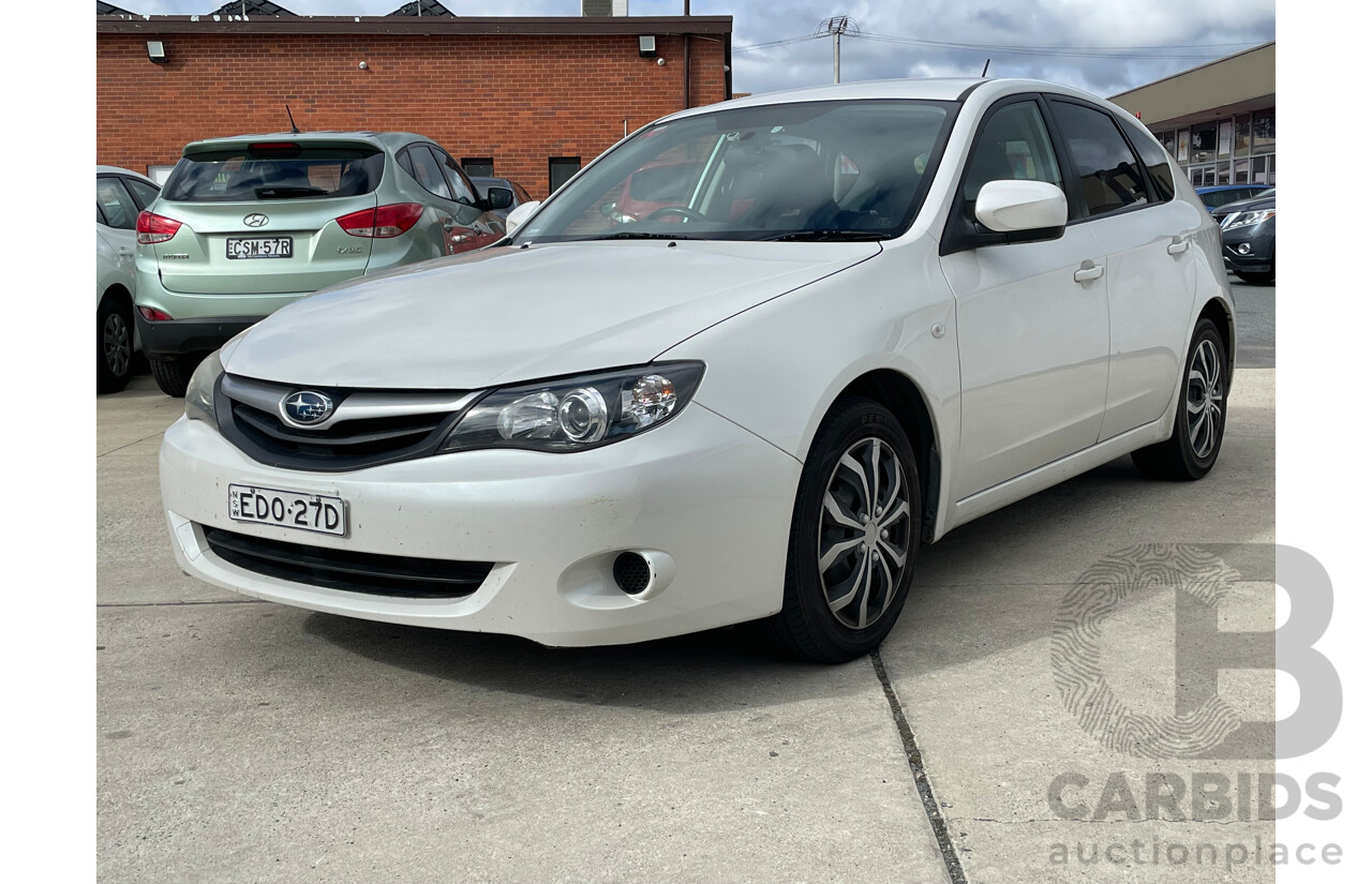 5/2010 Subaru Impreza R (awd) MY10 5d Hatchback White 2.0L
