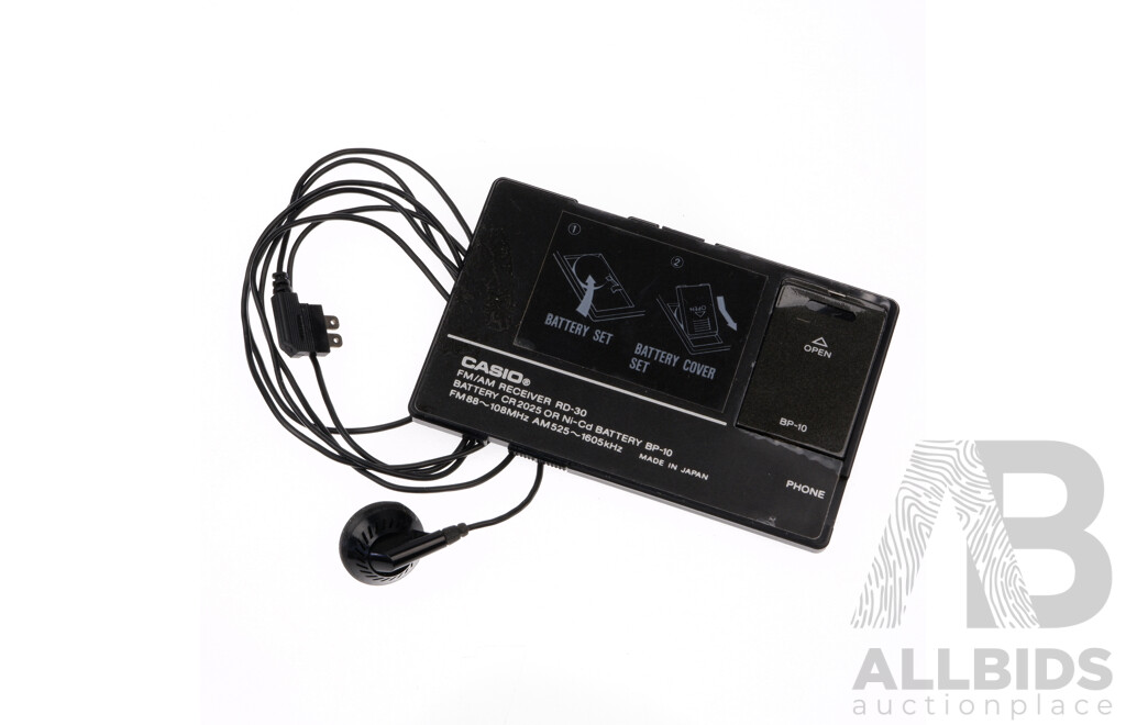 Vintage Casio FM and AM Card Receiver and Headphone