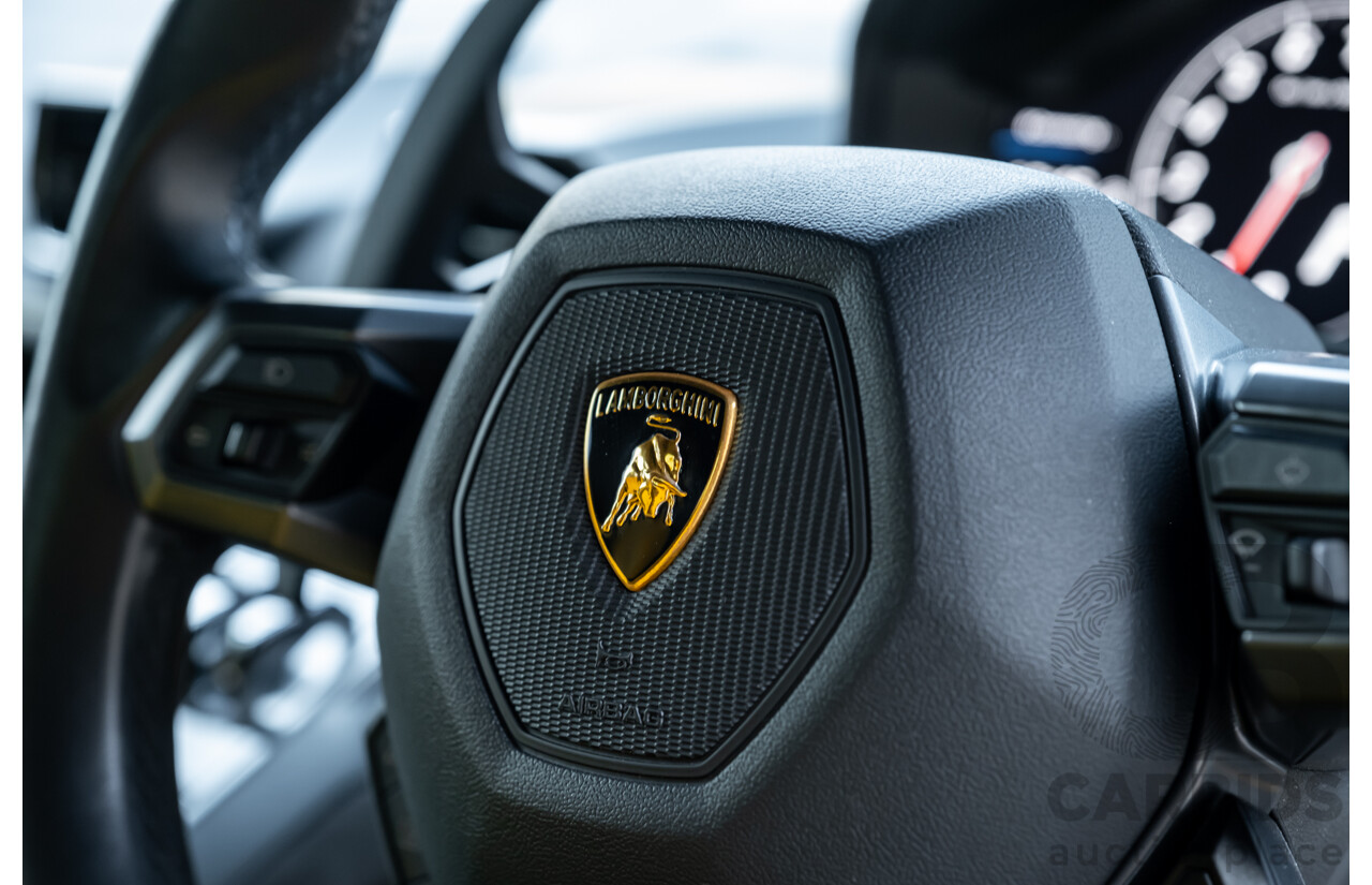 9/2015 Lamborghini Huracan LP 610-4 (AWD) 724 2d Coupe Grigio Nimbus Silver Metallic V10 5.2L