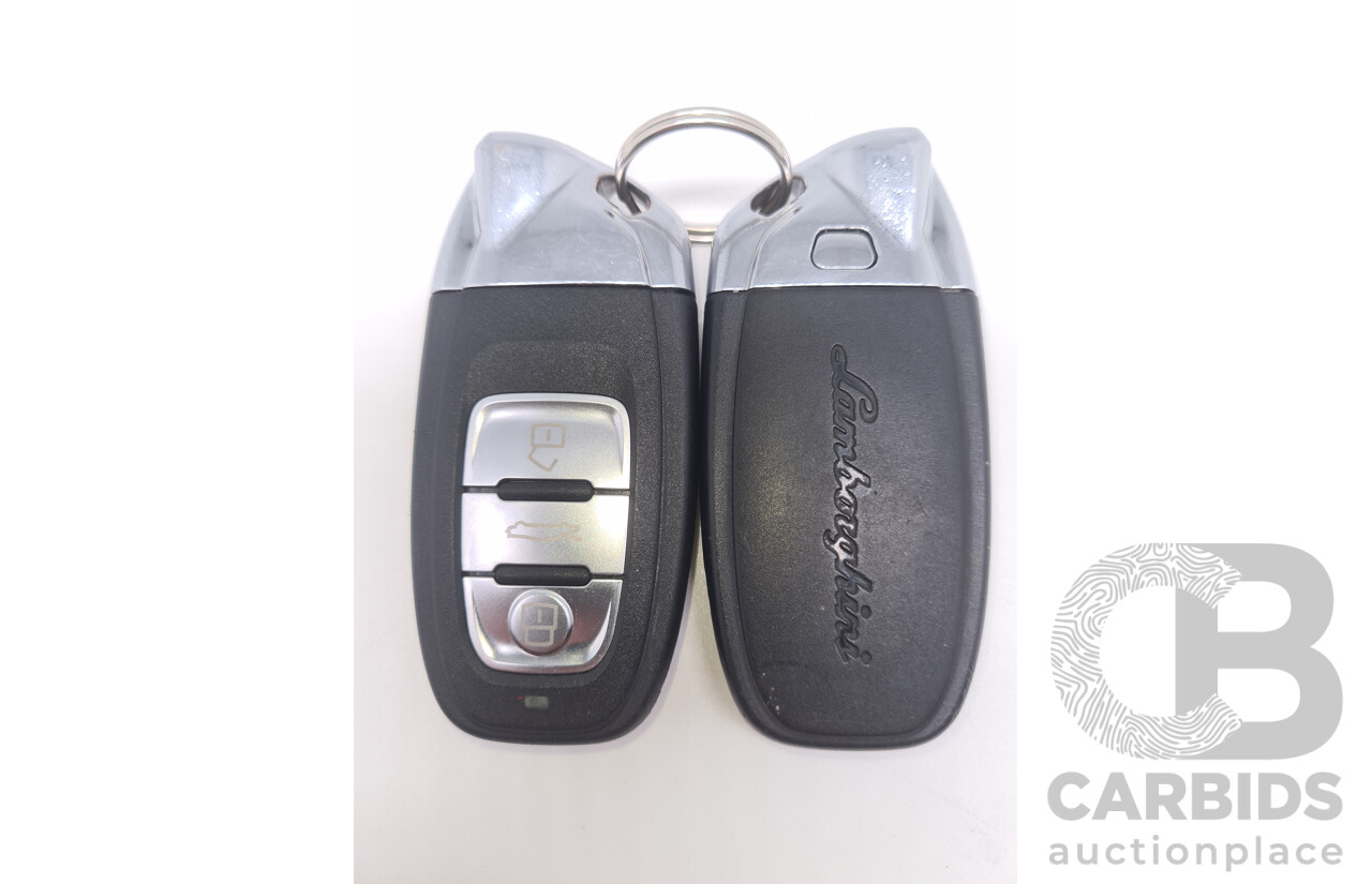 9/2015 Lamborghini Huracan LP 610-4 (AWD) 724 2d Coupe Grigio Nimbus Silver Metallic V10 5.2L