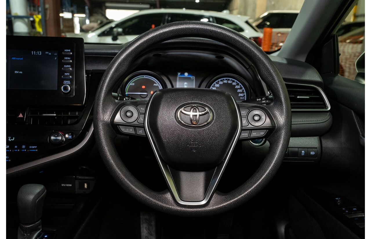 06/2021 Toyota Camry Ascent Hybrid MY21 AXVH70R 4d Sedan White 2.5L Hybrid