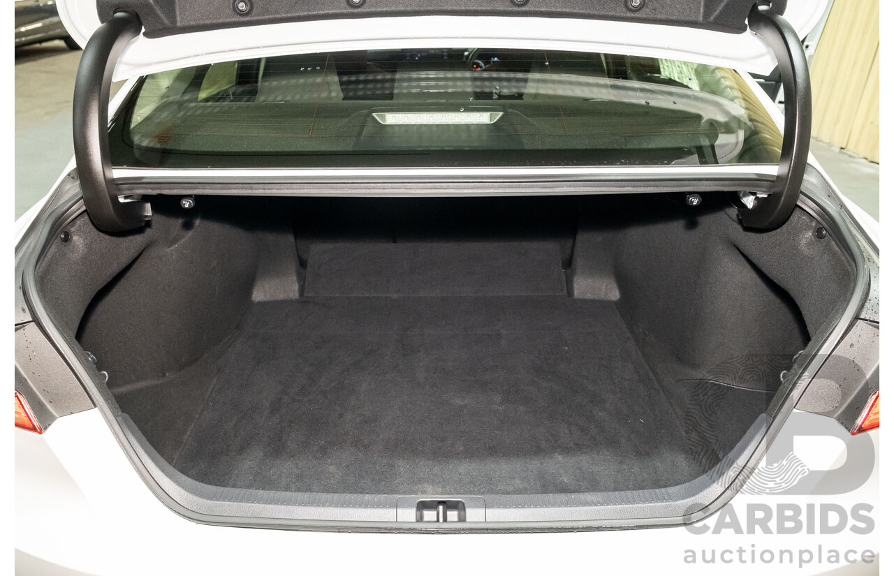 06/2021 Toyota Camry Ascent Hybrid MY21 AXVH70R 4d Sedan White 2.5L Hybrid