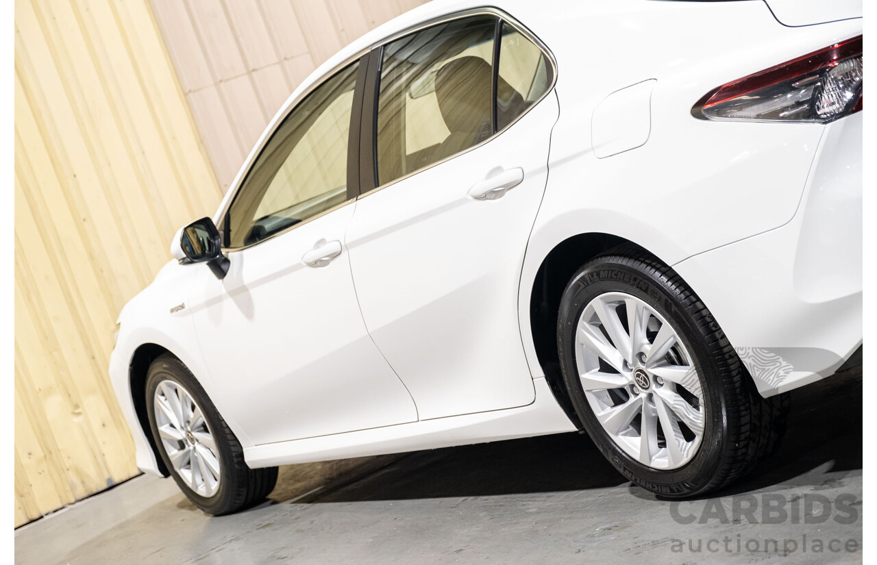 06/2021 Toyota Camry Ascent Hybrid MY21 AXVH70R 4d Sedan White 2.5L Hybrid