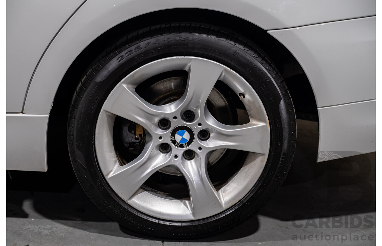 10/2010 BMW 320d Executive E90 MY10 LCI 4d Sedan White Turbo Diesel 2.0L