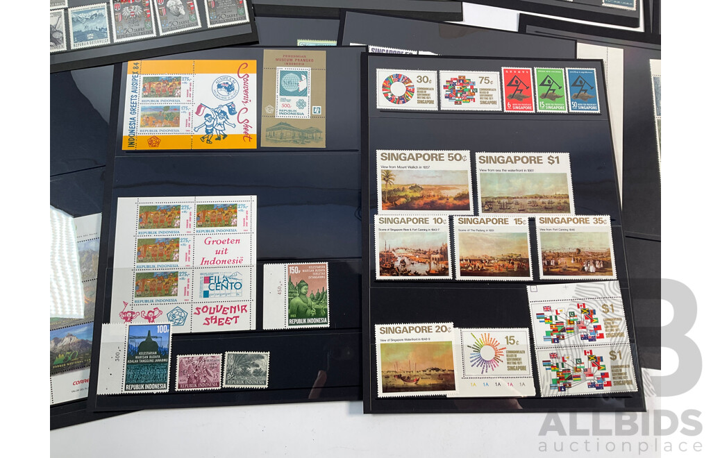 Collection of International Mint and Cancelled Stamps Including Austria, Japan, China, Singapore, Tuvalu, Indonesia, Chile